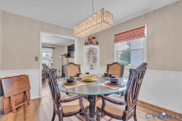a view of a dining room with furniture