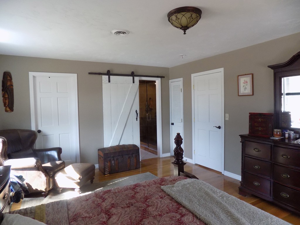 43 Brookfield Road Brimfield, MA 01010 - Photo 8 of 16 a bedroom with furniture and a window