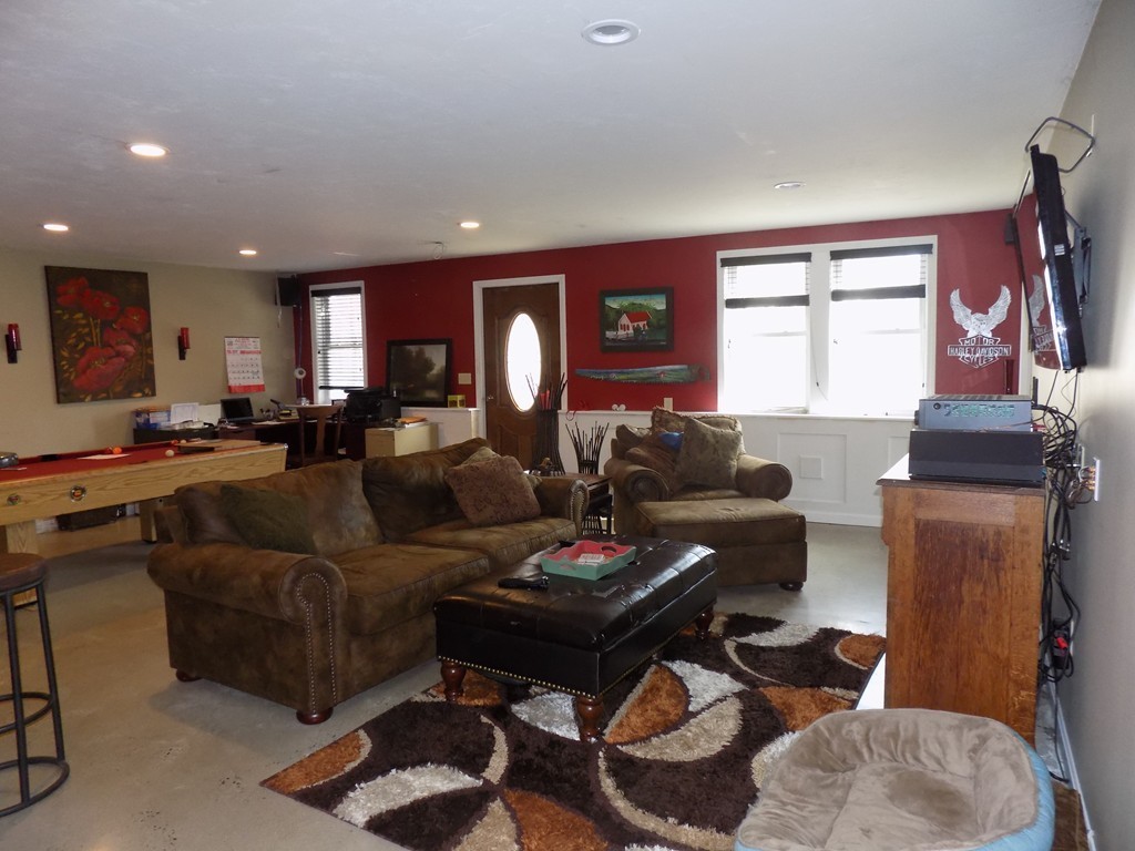 43 Brookfield Road Brimfield, MA 01010 - Photo 10 of 16 a living room with furniture a rug and a window