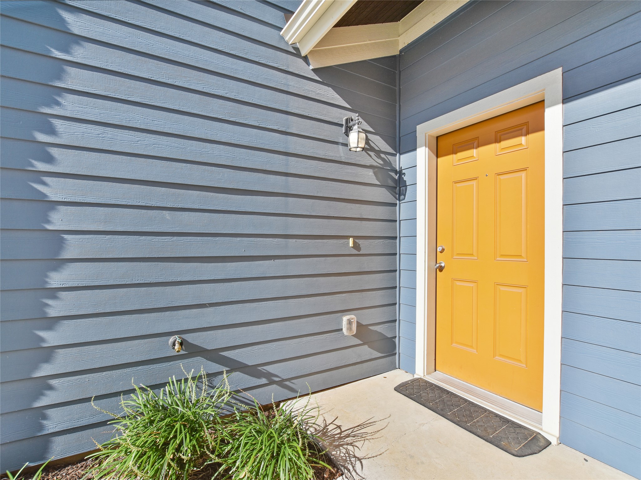 516 East Slaughter Lane, Unit 1801 Austin, TX 78744 - Photo 3 of 39 a view of a front door and wooden door