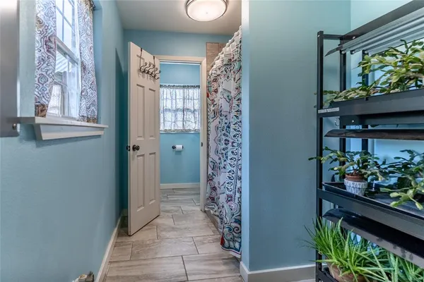 a view of entryway with wooden floor