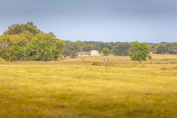 a view of an ocean and a mountain