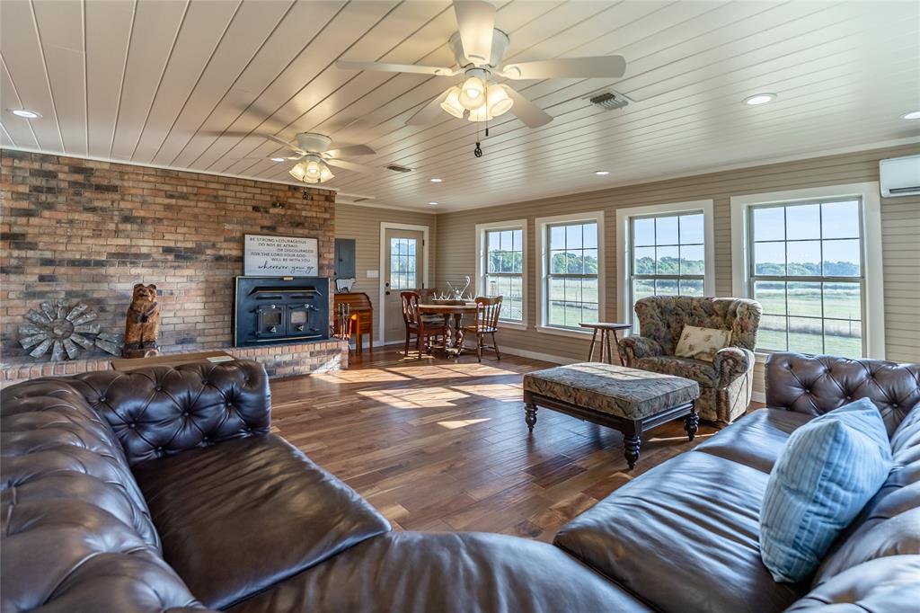 5147 Texas Highway Cooper, TX 75432 - Photo 3 of 31 a living room with furniture and a fireplace