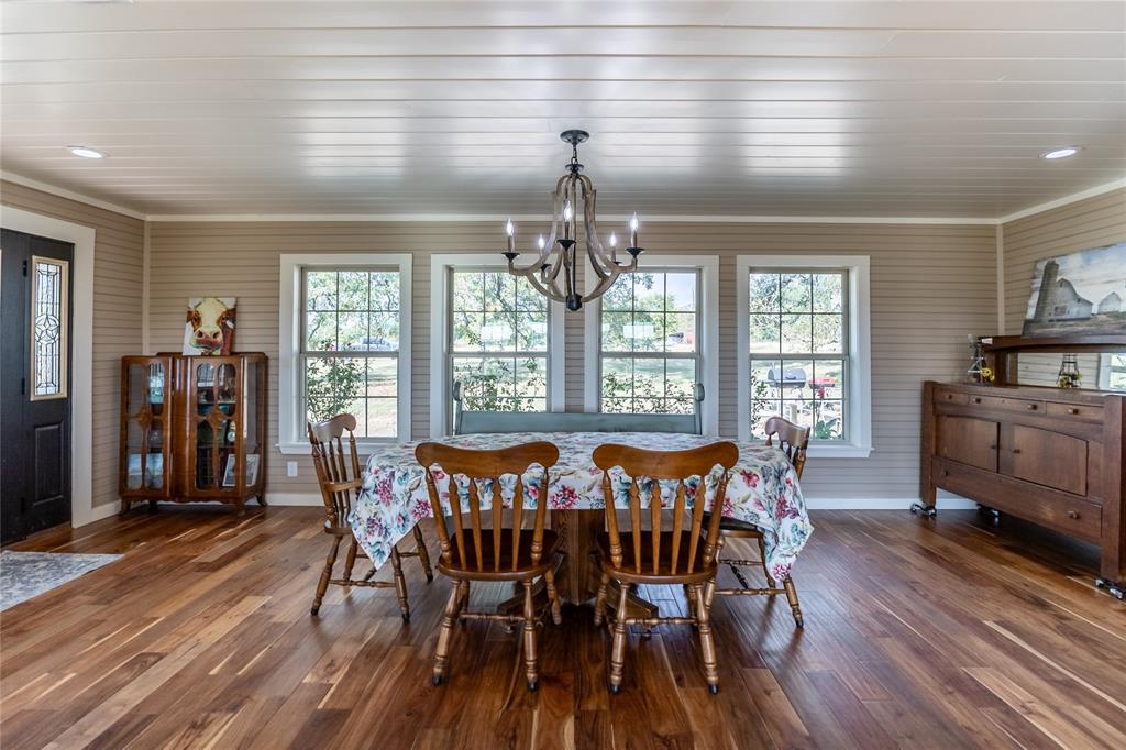 5147 Texas Highway Cooper, TX 75432 - Photo 7 of 31 a view of a dining room with furniture window and wooden floor