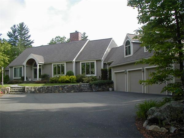 32 Townsend Farm Road Boxford, MA 01921 - Photo 1 of 25 a front view of a house with a yard