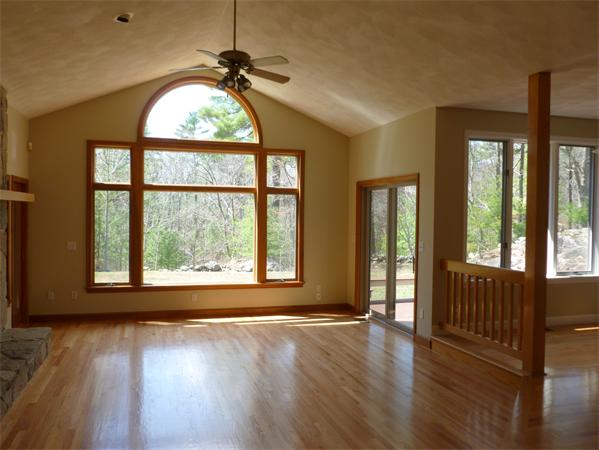 32 Townsend Farm Road Boxford, MA 01921 - Photo 11 of 25 a view of an empty room with wooden floor and a window