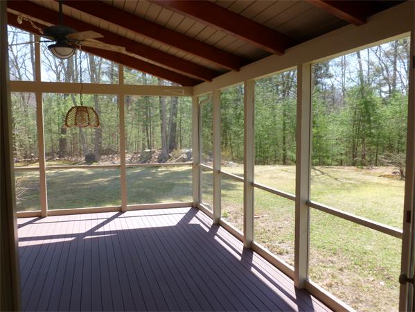 32 Townsend Farm Road Boxford, MA 01921 - Photo 20 of 25 a view of a glass door with a lake view