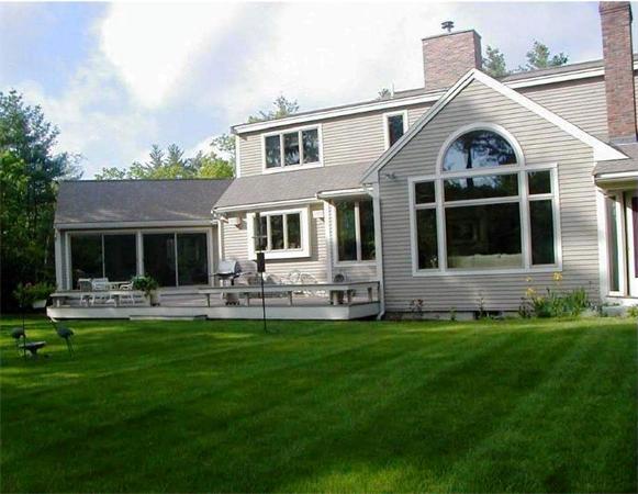 32 Townsend Farm Road Boxford, MA 01921 - Photo 2 of 25 a view of a house with a yard and sitting area