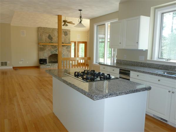 32 Townsend Farm Road Boxford, MA 01921 - Photo 5 of 25 a kitchen with stainless steel appliances granite countertop a sink stove and refrigerator