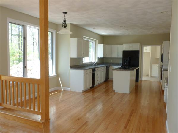 32 Townsend Farm Road Boxford, MA 01921 - Photo 6 of 25 a view of a kitchen with microwave and wooden floor