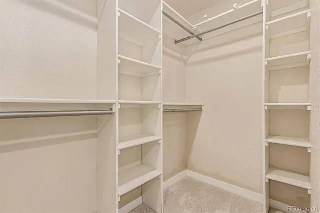 a view of a storage & utility room with washer and dryer
