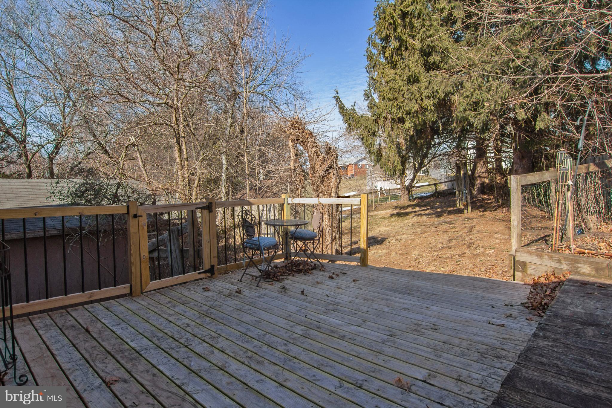 4226 Lower Beckleysville Road Hampstead, MD 21074 - Photo 29 of 34 Rebuilt lower deck with steps out to yard