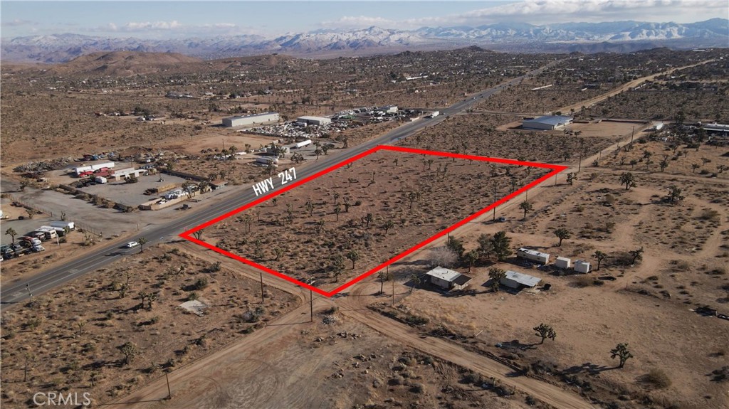 56825 Sun Oro Road Yucca Valley, CA 92284 - Photo 7 of 10 an aerial view of beach and residential houses