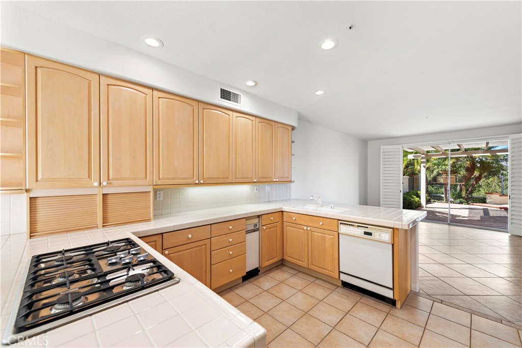 5 Siena Laguna Niguel, CA 92677 - Photo 25 of 61 solid maple cabinetry in the kitchen