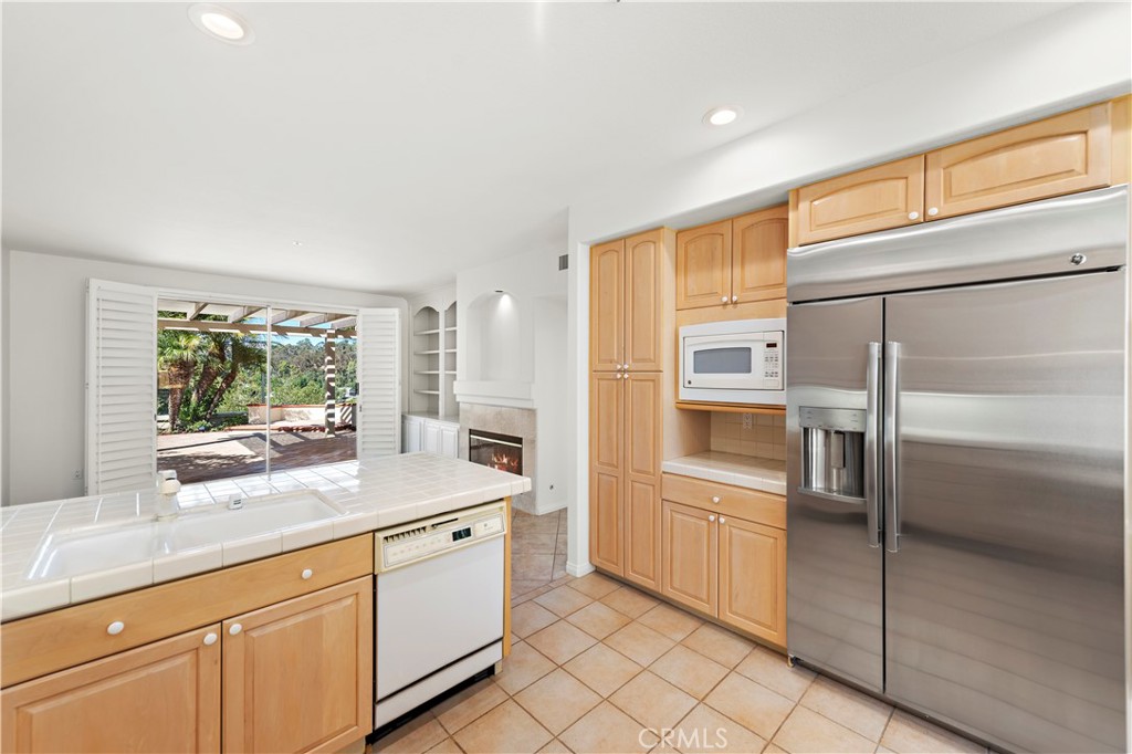 5 Siena Laguna Niguel, CA 92677 - Photo 26 of 61 view from the kitchen to the adjoining family room