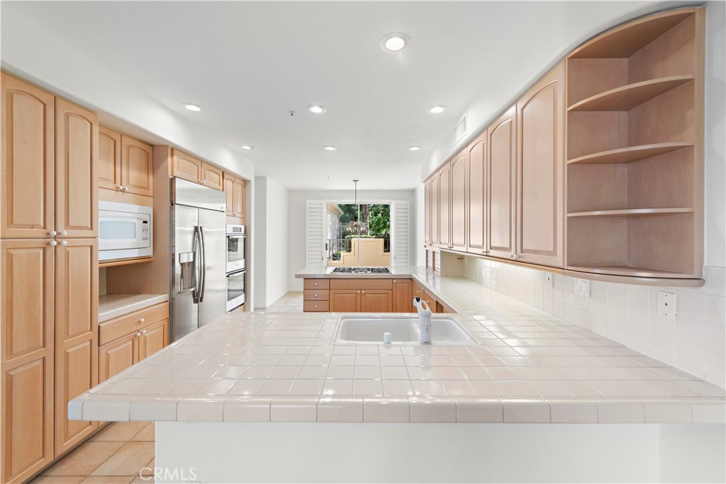 5 Siena Laguna Niguel, CA 92677 - Photo 27 of 61 view from family room to counter at the Kitchen