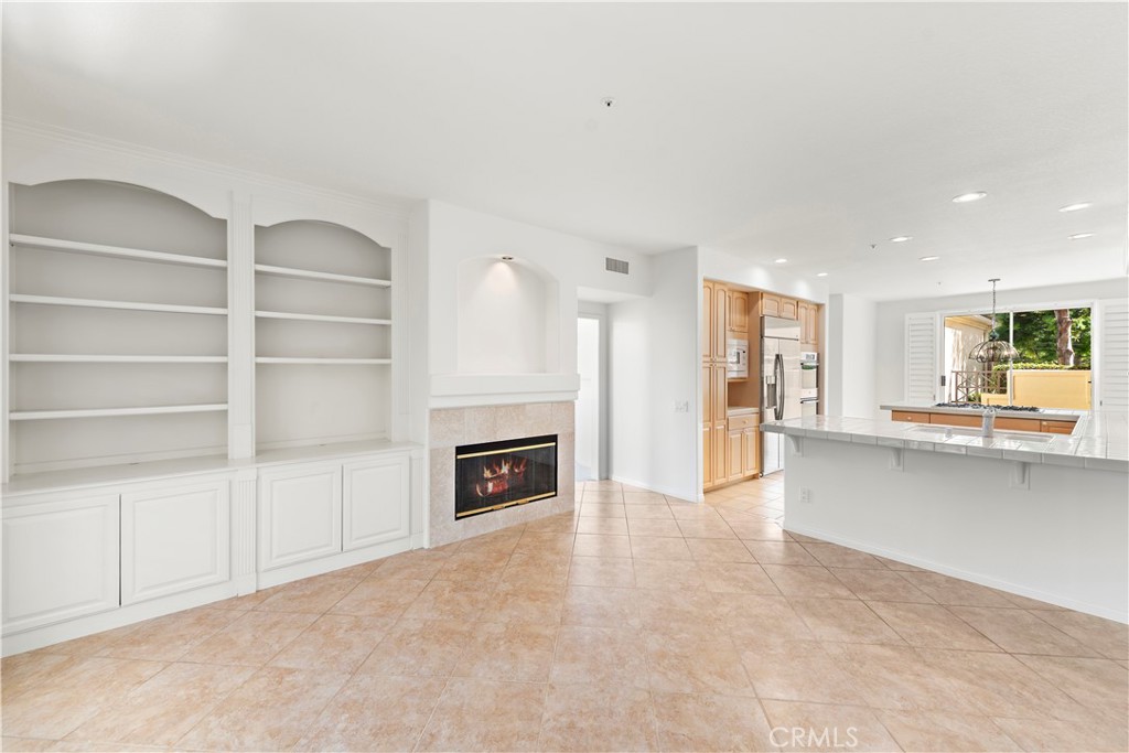 5 Siena Laguna Niguel, CA 92677 - Photo 30 of 61 family room adjacent the kitchen and bar seating