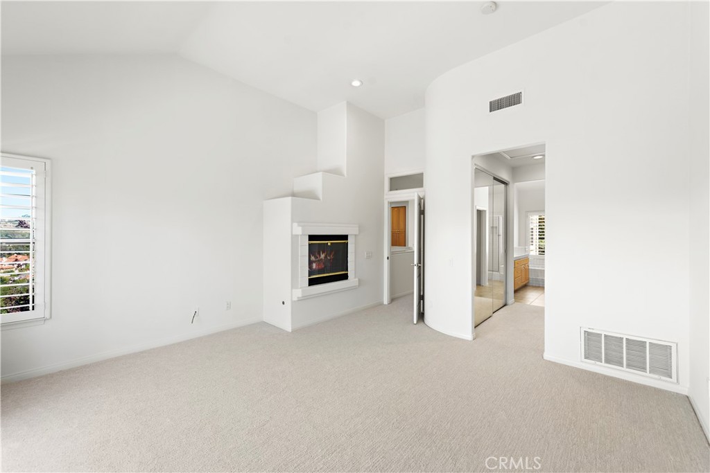5 Siena Laguna Niguel, CA 92677 - Photo 34 of 61 fireplace in primary suite