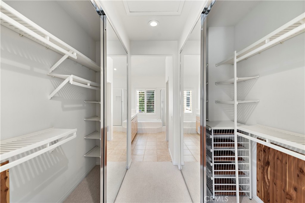 5 Siena Laguna Niguel, CA 92677 - Photo 40 of 61 glass wardrobe doors, and cedar lined closets in the primary bedroom