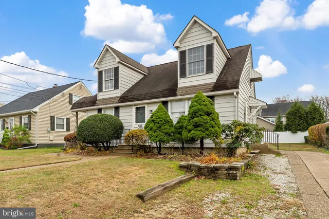 a front view of a house with swimming pool