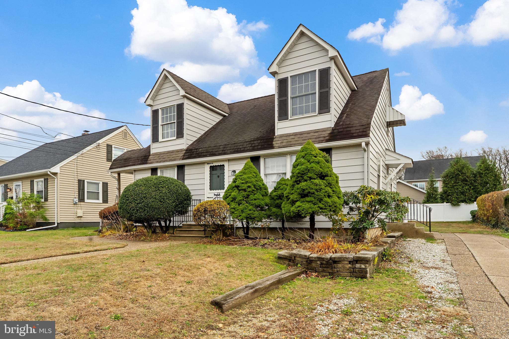 a front view of a house with swimming pool