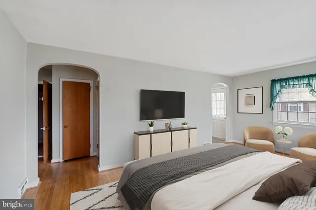 a kitchen with sink refrigerator and stove
