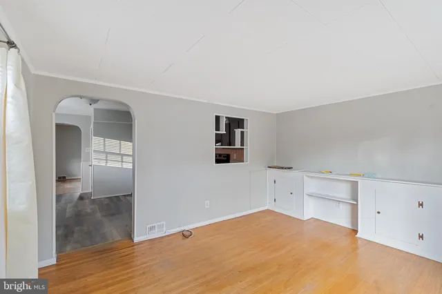 an empty room with windows