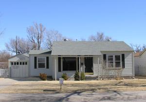 4309 Parker Street Amarillo, TX 79110 - Photo 1 of 1 a view of a house with a tree in front
