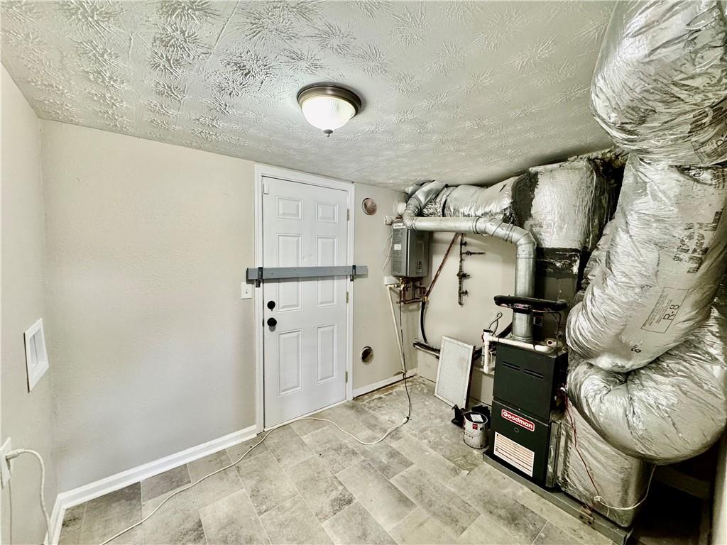 4922 Windsor Downs Lane Decatur, GA 30035 - Photo 22 of 23 a view of utility room