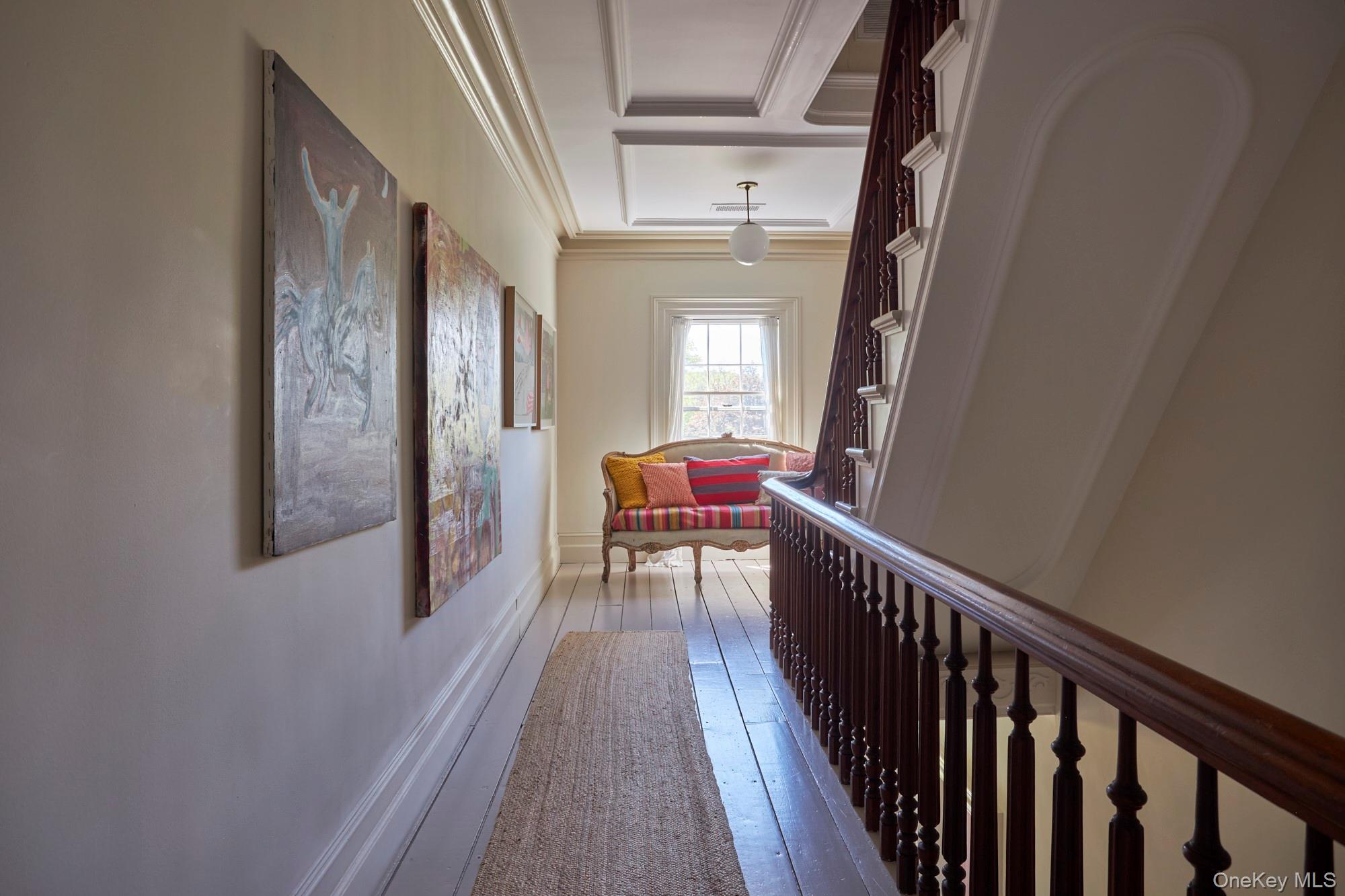 44 Main Street Germantown, NY 12526 - Photo 22 of 34 Hallway featuring hardwood / wood-style floors and crown molding
