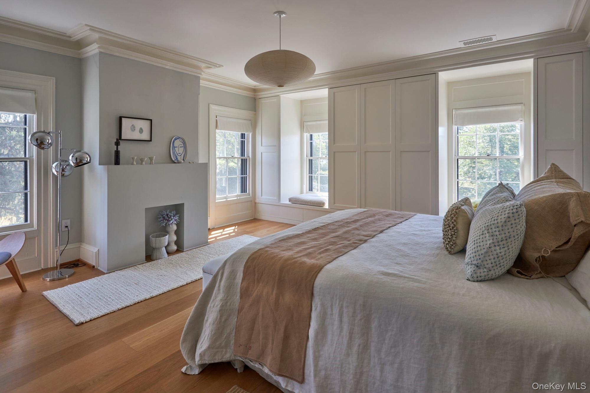 44 Main Street Germantown, NY 12526 - Photo 29 of 34 Bedroom featuring ornamental molding and wood finished floors