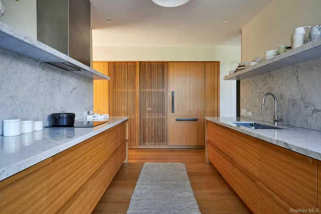 a bathroom with sink shower and bathtub