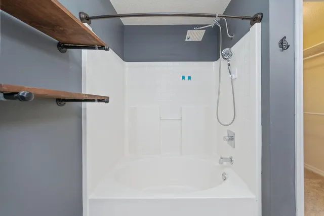 a bathroom with a bathtub