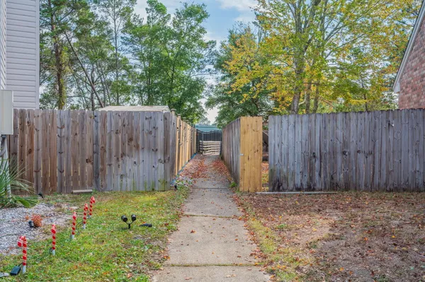 a backyard of a house with lots of green space