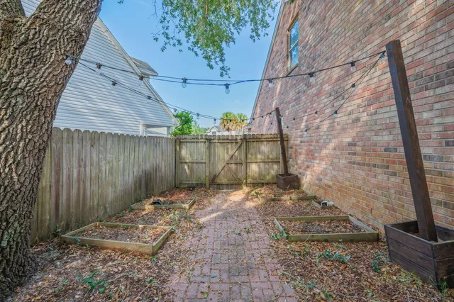 a view of a house with a yard and garage