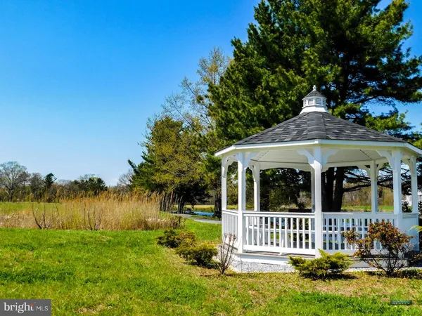 a view of balcony with furniture