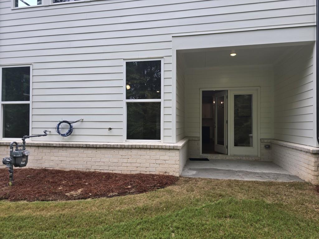 4240 Cavalier Way Duluth, GA 30097 - Photo 38 of 46 a view of a entryway front of a house