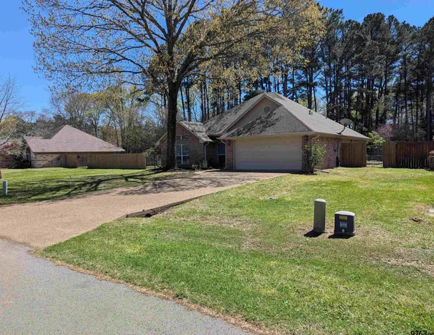 a house with trees in front of it