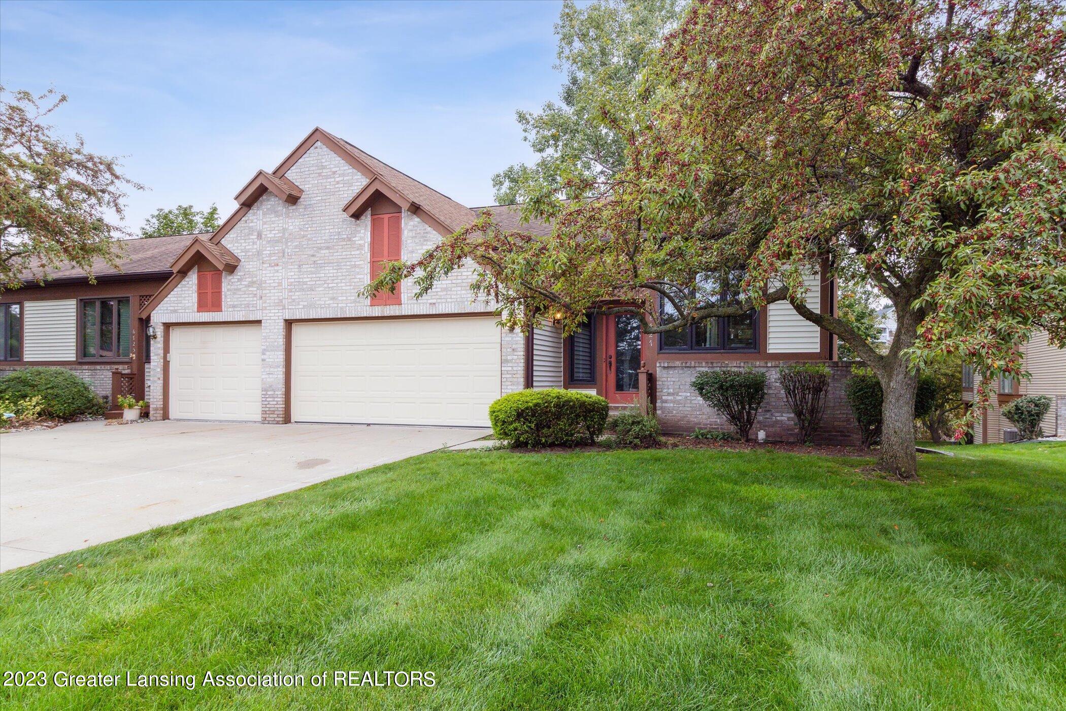 6727 Spring Tree Lane, Unit 117 Lansing, MI 48917 - Photo 2 of 36 04-6727-Spring-Tree-Ln-Lansing-MI-48917-