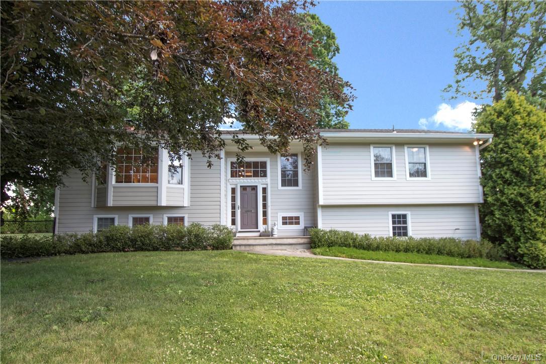9 Franklin Avenue Rye, NY 10580 - Photo 35 of 35 a front view of a house with a yard