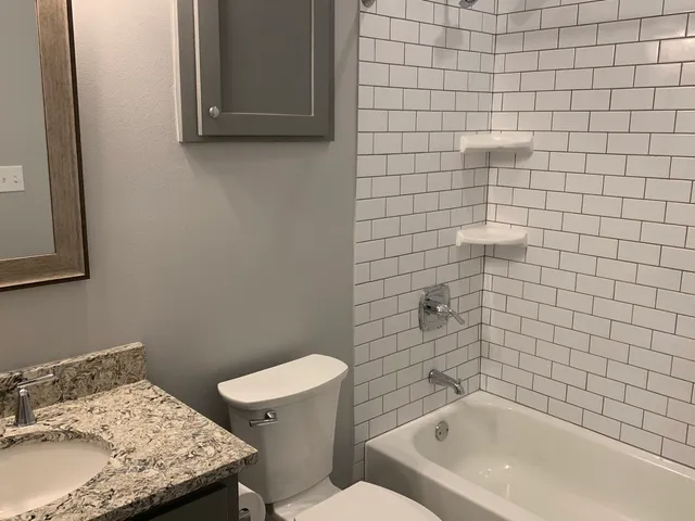 a bathroom with a sink and toilet