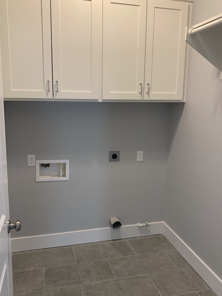 2509 South Grand Boulevard, Unit B Pearland, TX 77581 - Photo 6 of 13 a view of cabinets