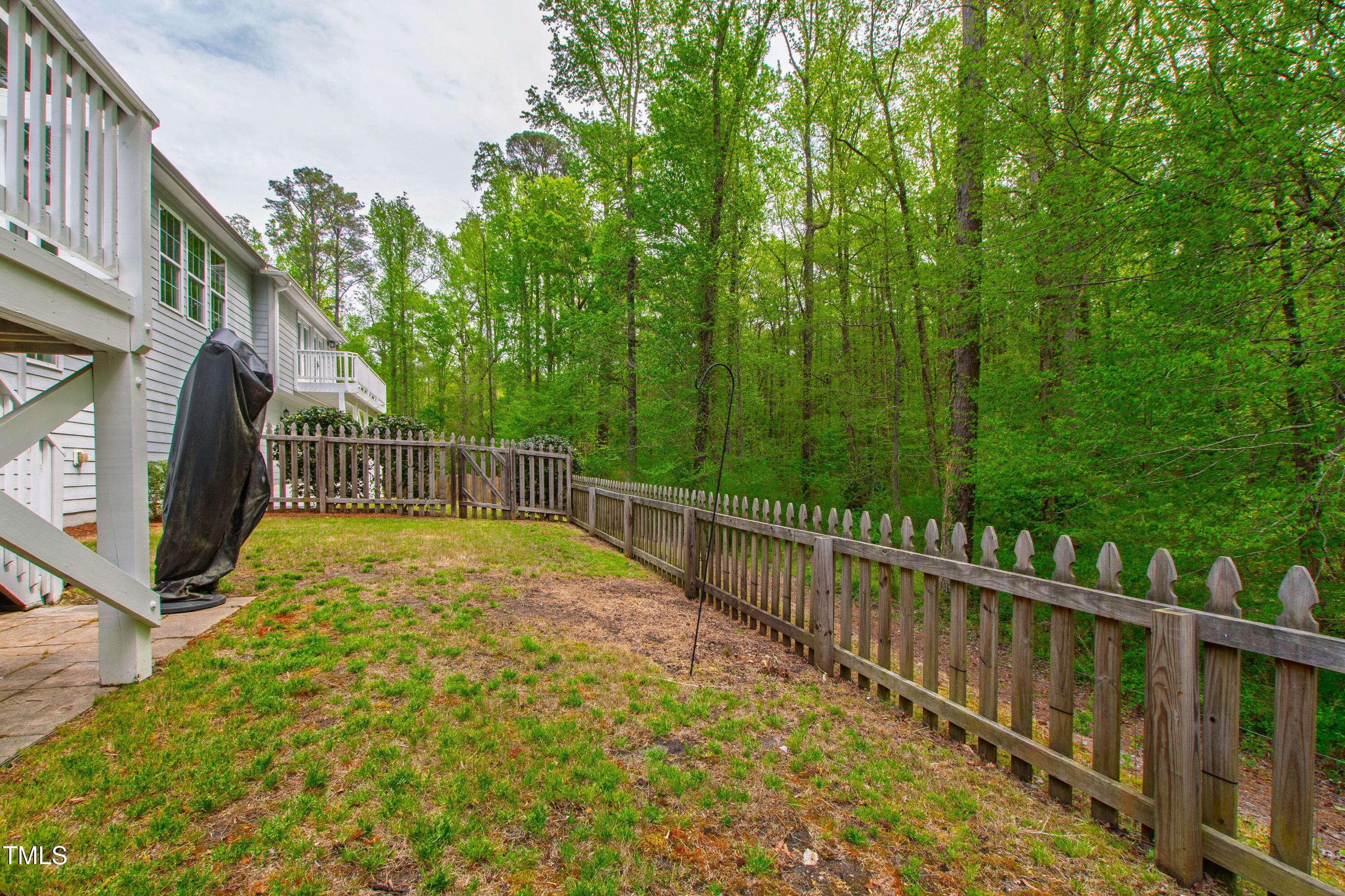 12833 Edsel Drive Raleigh, NC 27613 - Photo 69 of 72 a view of balcony with yard and green space
