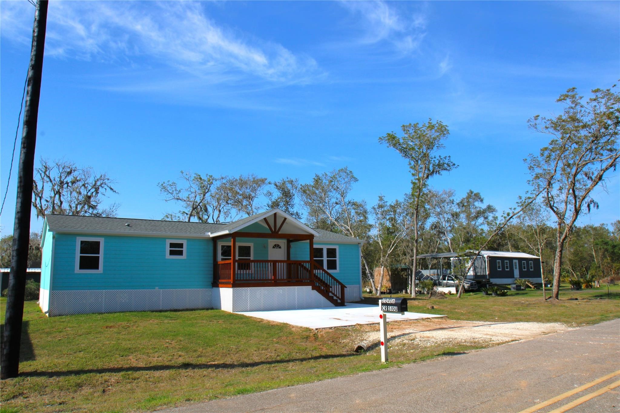 20406 Cr 510u Road Brazoria, TX 77422 - Photo 12 of 13 a front view of a house with a yard