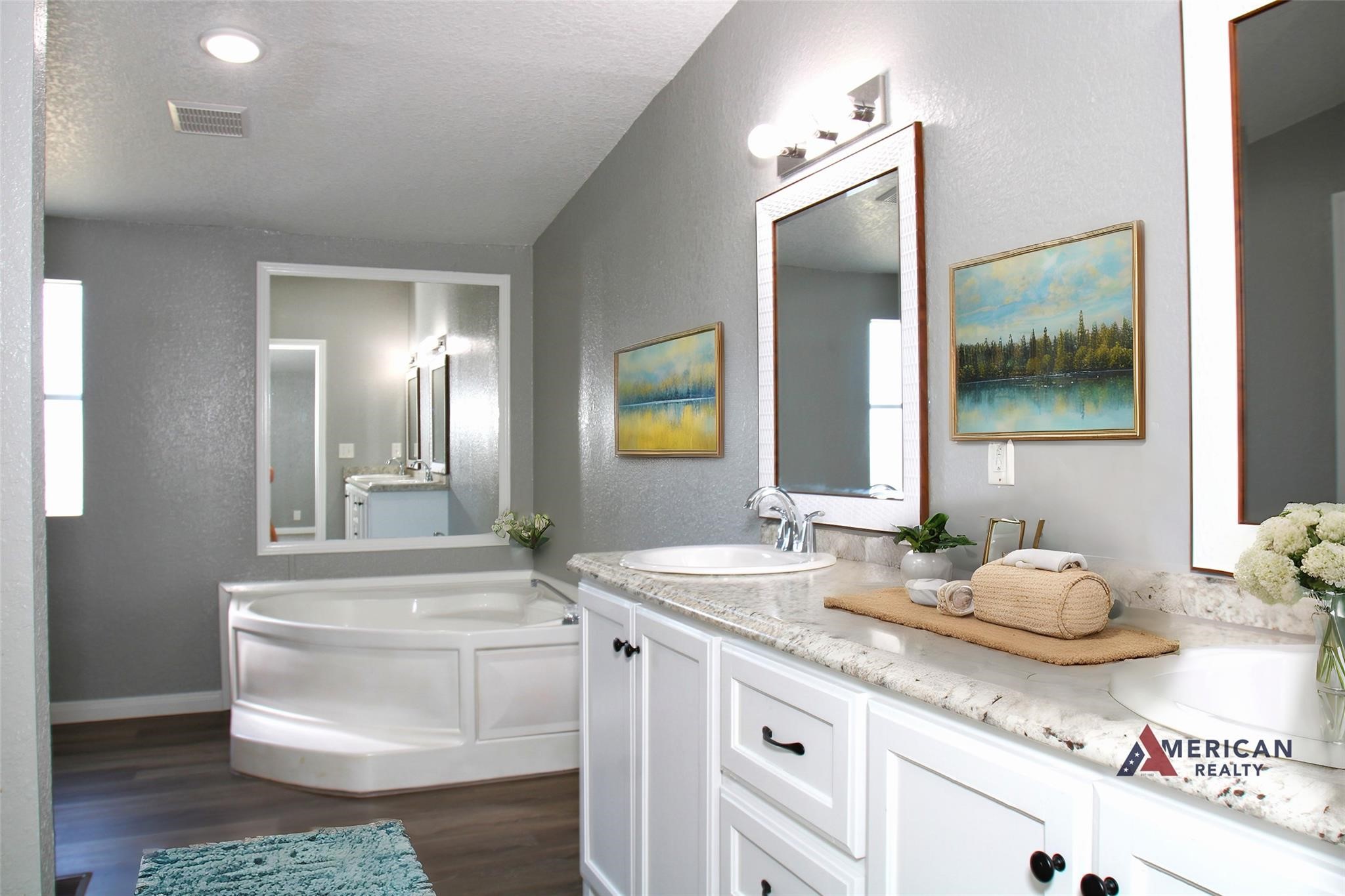 20406 Cr 510u Road Brazoria, TX 77422 - Photo 6 of 13 a bathroom with a granite countertop sink and a mirror