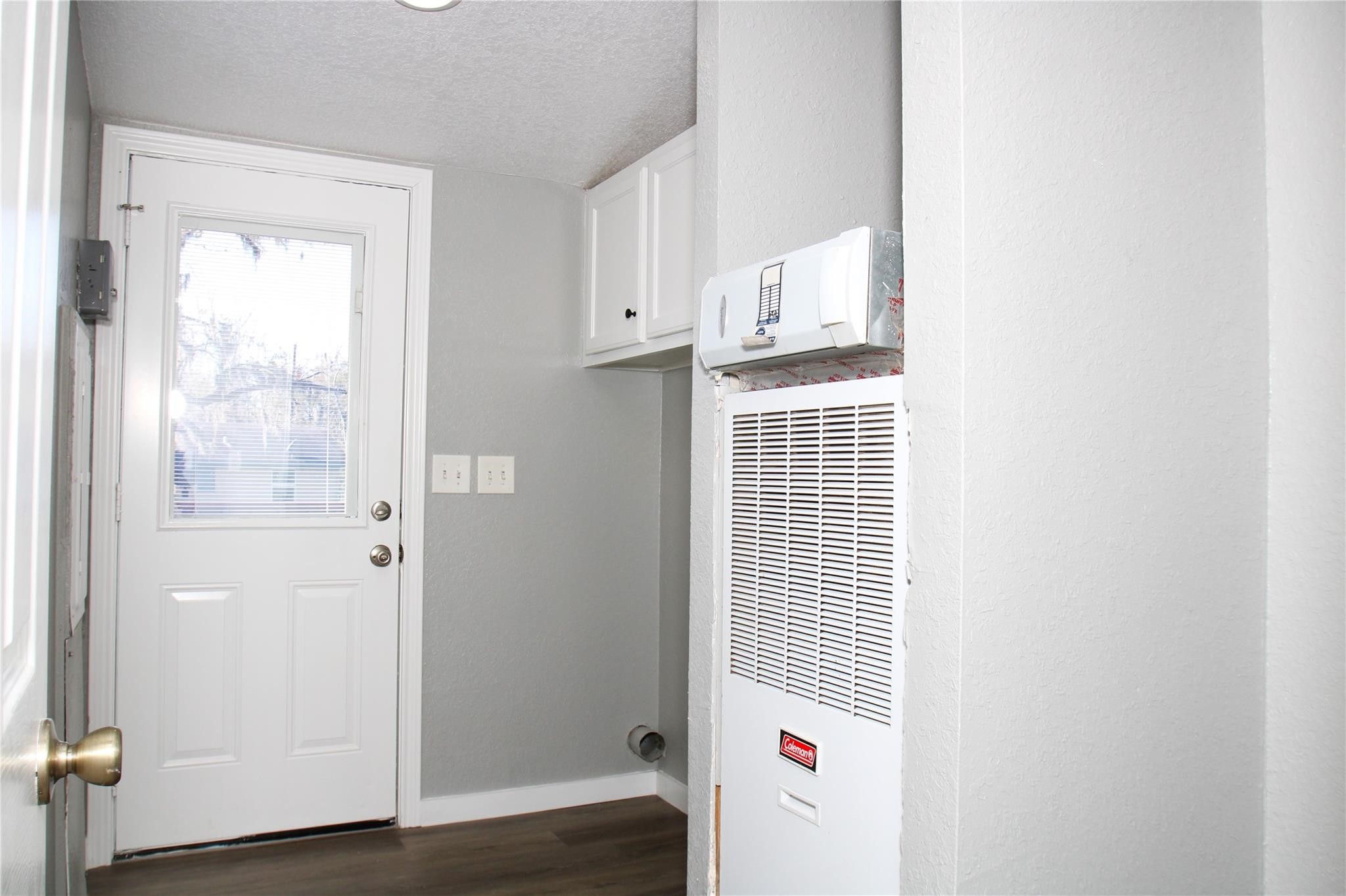 20406 Cr 510u Road Brazoria, TX 77422 - Photo 10 of 13 a view of an empty room with wooden floor and a window
