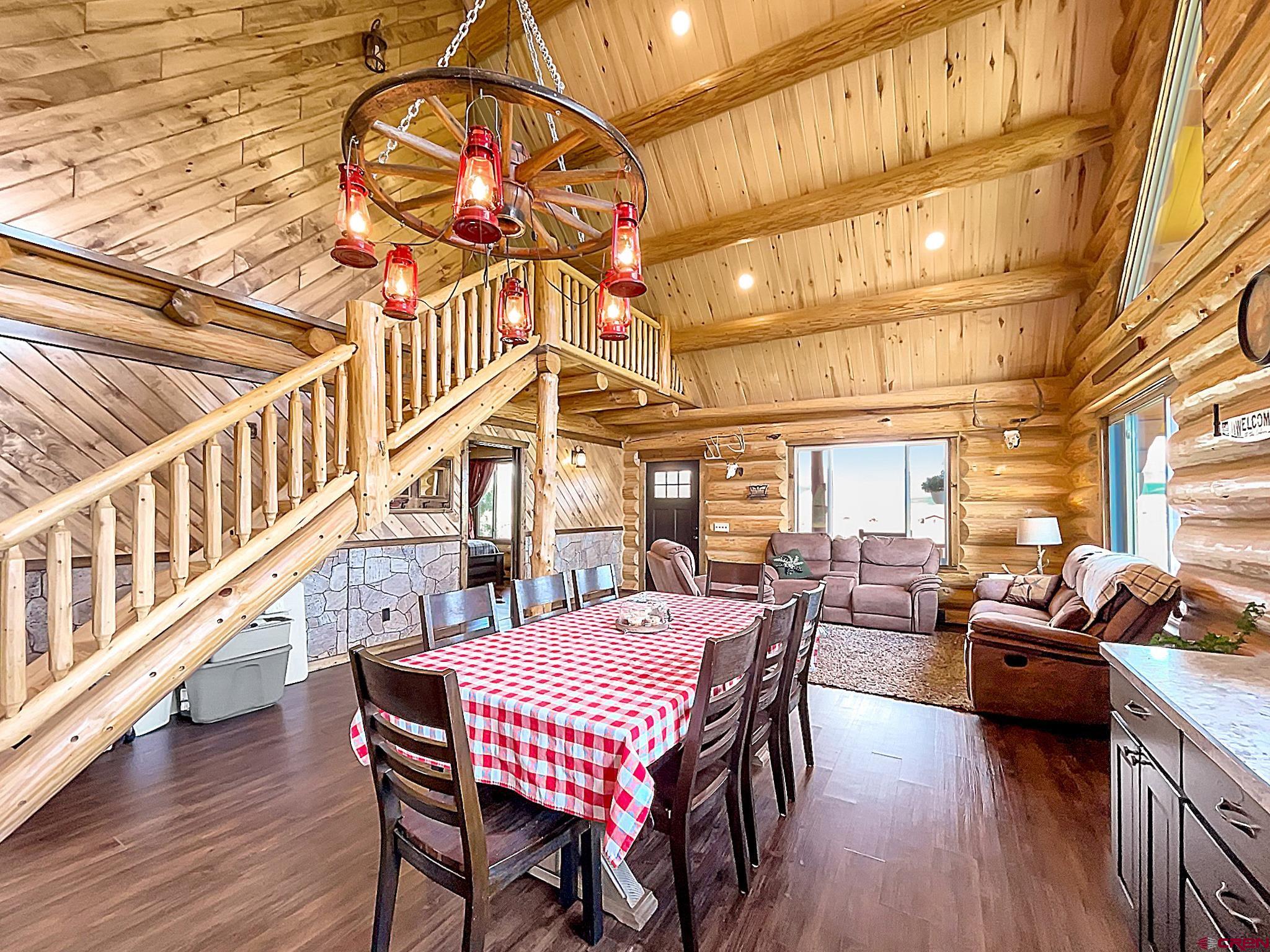 78114 Basalt Road Crawford, CO 81415 - Photo 11 of 35 a view of a dining room with furniture window and wooden floor