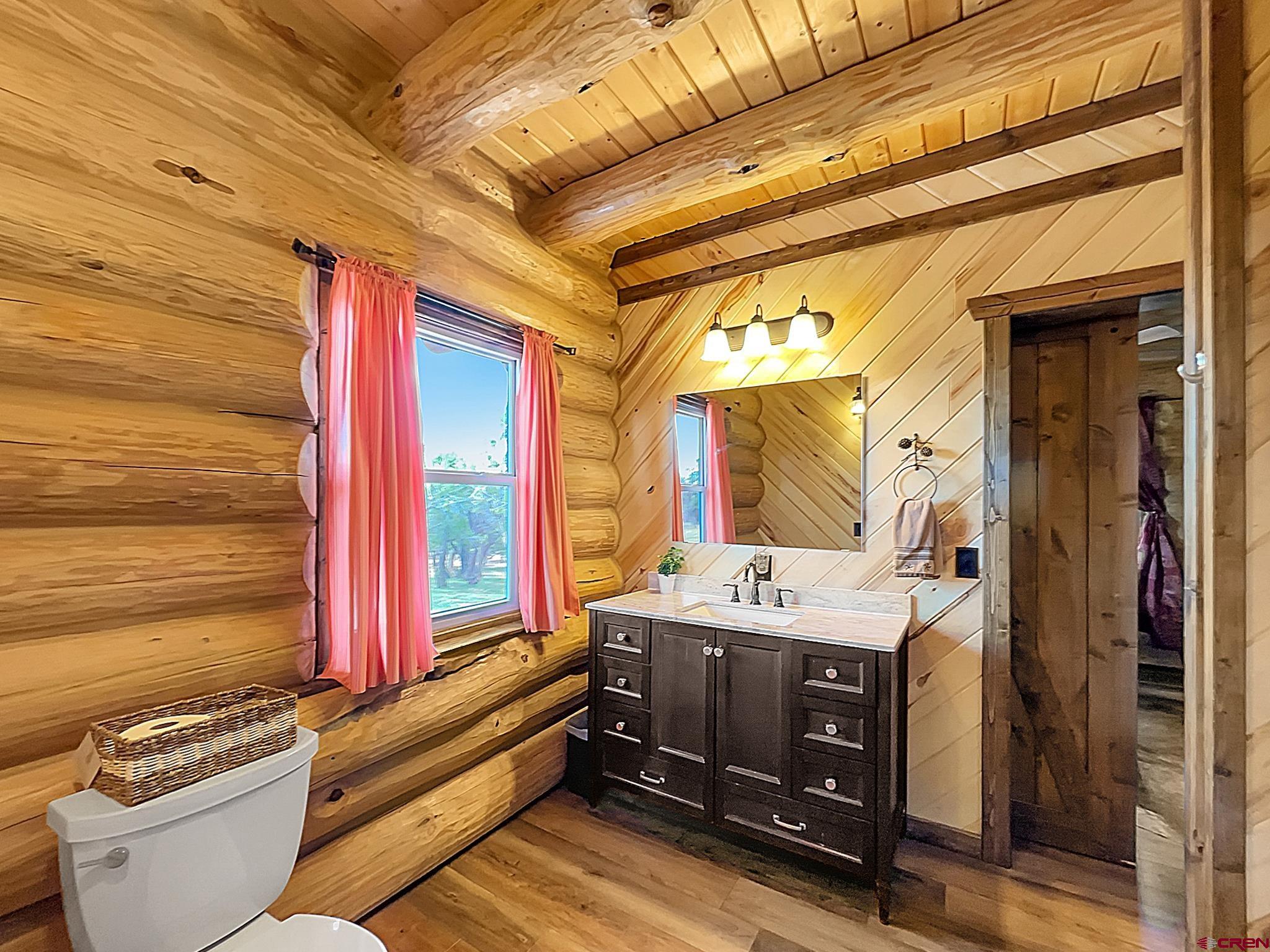 78114 Basalt Road Crawford, CO 81415 - Photo 21 of 35 a room with furniture and window