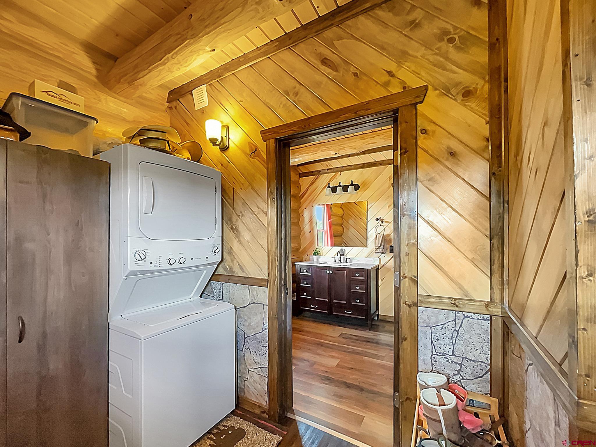 78114 Basalt Road Crawford, CO 81415 - Photo 22 of 35 a utility room with dryer and washer
