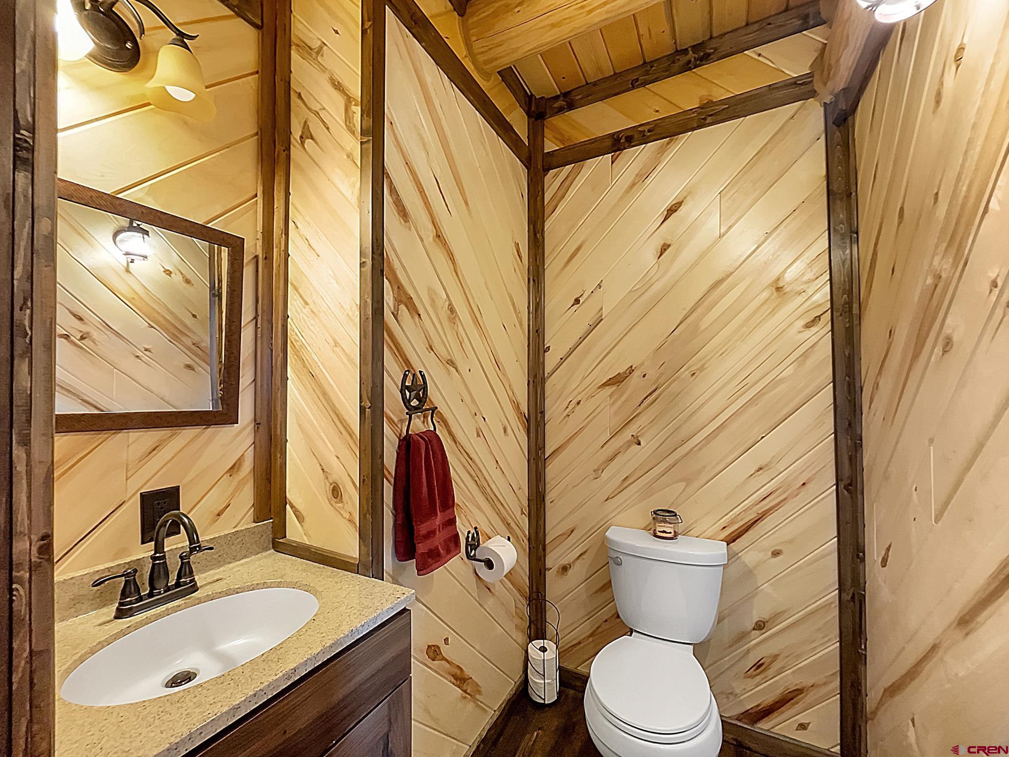78114 Basalt Road Crawford, CO 81415 - Photo 23 of 35 a bathroom with a sink toilet and shower